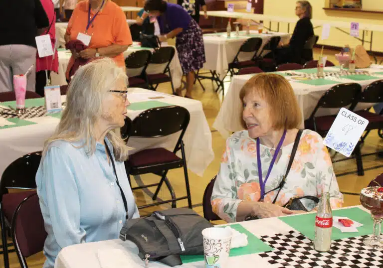 Once the weekend moved to Maple Hall, 1968 classmates Mary Lou Mattingly O’Brien, left, and Deborah Lord Campisano chat before the business meeting. Once the weekend moved to Maple Hall, 1968 classmates Mary Lou Mattingly O’Brien, left, and Deborah Lord Campisano chat before the business meeting.