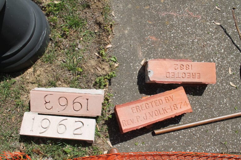 Bricks from the original building in 1874, the first addition in 1882, and additions in 1962 and 1963 were removed.