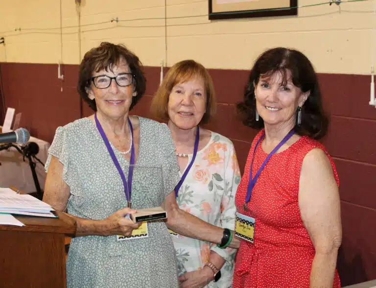 Pat Wedding Stelmach A’68, left, holds her Maple Leaf Award, with her presenter Deborah Lord Campisano, center, and Alumnae Association officer Carolyn Sue Cecil. Pat Wedding Stelmach A’68, left, holds her Maple Leaf Award, with her presenter Deborah Lord Campisano, center, and Alumnae Association officer Carolyn Sue Cecil.