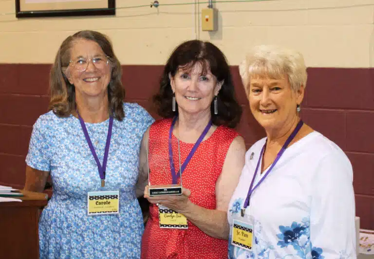 Maple Leaf Award winner Carole Caummisar Sanders A’68, left, is joined by Alumnae Association officer Carolyn Sue Cecil, center, and her presenter, Sister Pam Mueller A’68. Maple Leaf Award winner Carole Caummisar Sanders A’68, left, is joined by Alumnae Association officer Carolyn Sue Cecil, center, and her presenter, Sister Pam Mueller A’68.