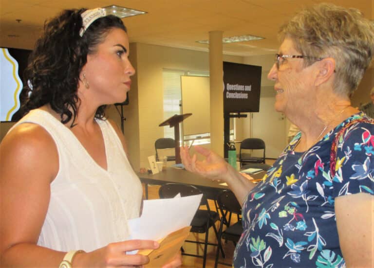 Becky Brandle, left, community coordinator for the Owensboro Human Relations Commission, talks with Sister Betsy Moyer during a break in the presentation. Brandle assisted Jaklyn-Mahree Hill with her presentations.