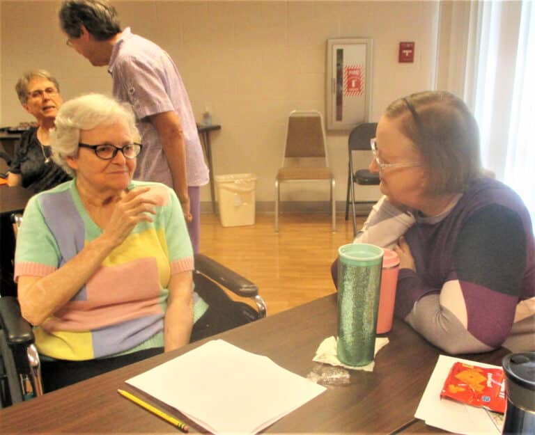 Sister Pat Rhoten, left, makes a point as Sister Rebecca White listens. Sister Pat is celebrating 60 years as an Ursuline this year.