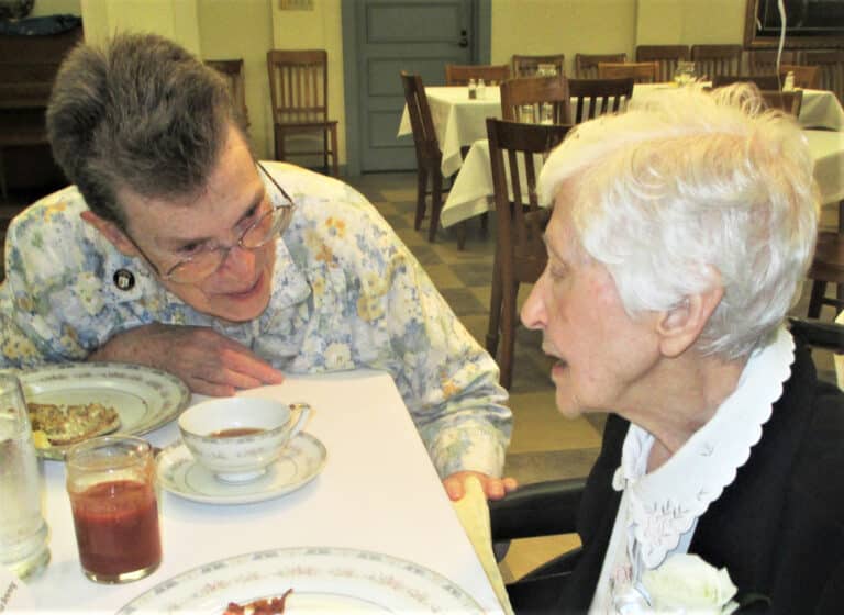 Sister Sharon Sullivan, left, congregational leader, talks with Sister Clarita Browning over lunch. Sister Clarita is celebrating 75 years as a Sister this year. Sister Sharon’s early years of serving at Brescia College overlapped with the final five years of Sister Clarita’s time at Brescia.