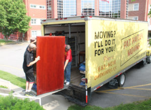 The movers filled this truck with furniture and boxes, and half of another truck.