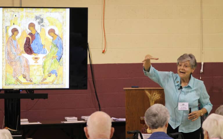 Sister Cheryl Clemons tells the participants that one of the reasons Saint Angela became a Third Order Franciscan is so she could attend daily Mass and receive the Eucharist.