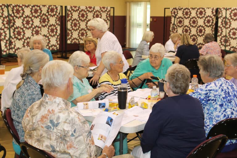 This table featured several Western Kentucky Associates and Sisters Cecelia Joseph Olinger and Ann McGrew discussing one of Sister Cheryl’s questions. In the center is Associate Betty Boren from Hopkinsville, Ky.