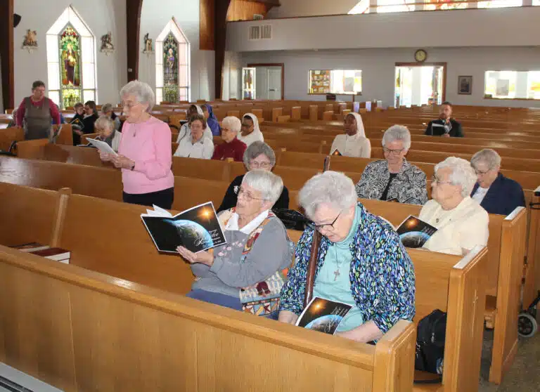 Ursuline Sisters gather with Franciscans, Glenmarys and Sisters of the Lamb of God to sing the prelude, “Christ in Me Arise.” Ursuline Sisters gather with Franciscans, Glenmarys and Sisters of the Lamb of God to sing the prelude, “Christ in Me Arise.”