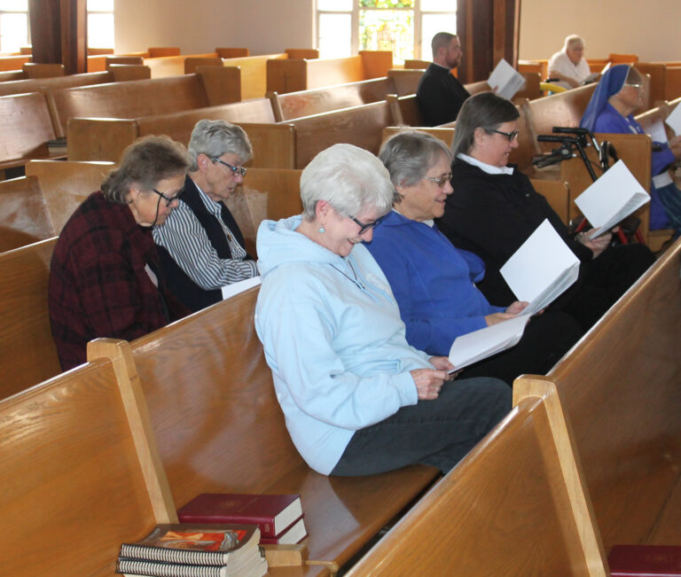 Singing along with the opening hymn are, from left, Ursuline Sisters Alicia Coomes, Judith Nell Riney, Pam Mueller, Jacinta Powers, and Monica Seaton. Singing along with the opening hymn are, from left, Ursuline Sisters Alicia Coomes, Judith Nell Riney, Pam Mueller, Jacinta Powers, and Monica Seaton.
