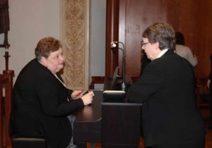 Sister Amelia Stenger, right, congregational leader for the Ursuline Sisters, congratulates Lisa Screeton after the concert.