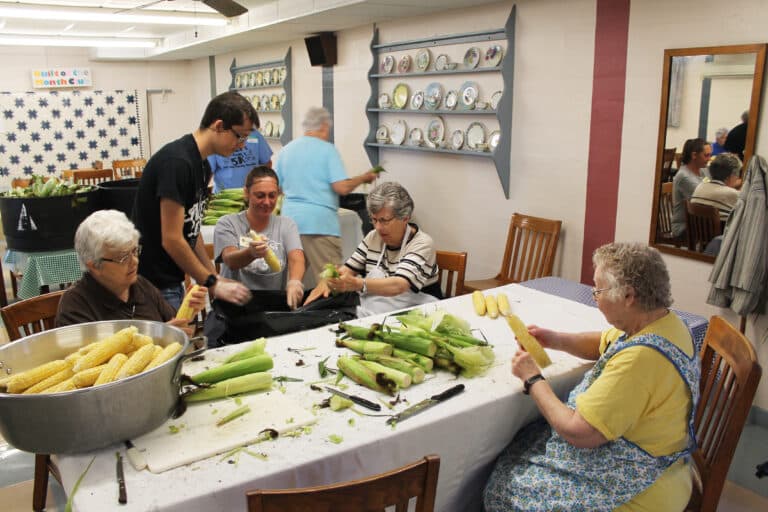 Sisters and Food Service staff work together to make quite a production line. From left are Sister Cecelia Joseph Olinger, staffer and Associate Wes Wheatley, staff member Devin Gibson, Sister Margaret Ann Aull and Sister Marie Joseph Coomes.
