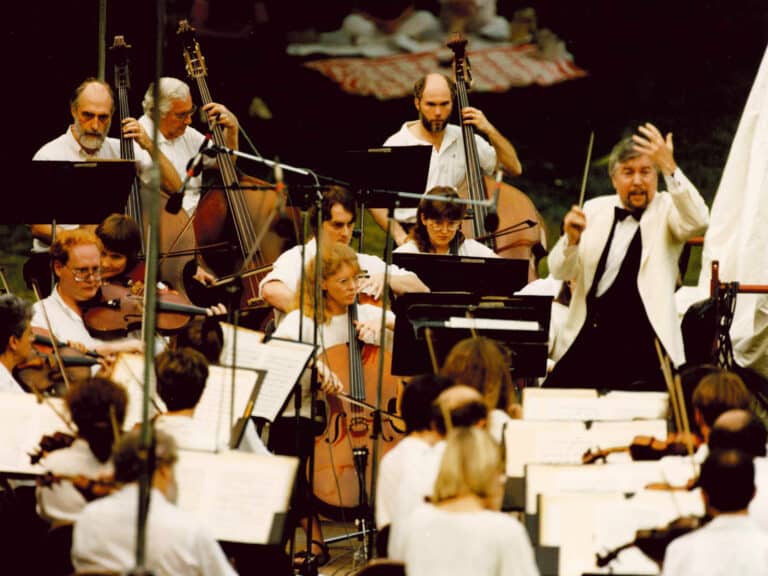 James White, right, leads the final symphony performance in 1992.