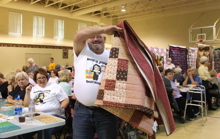 The Quilt Bingo shirt brought luck to Jody Tungate of Bradfordsville, Ky.,