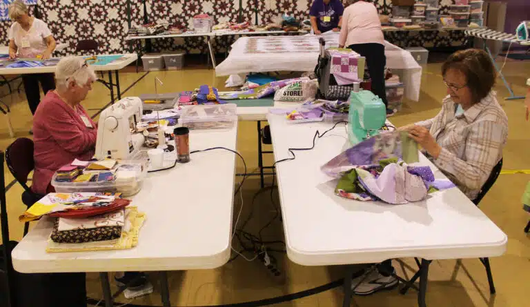 Kay Clark, left, and Joni Hayden, both of Owensboro, work on their projects. Hayden began quilting 30 years ago, after Sister Rosanne Spalding taught her. Kay Clark, left, and Joni Hayden, both of Owensboro, work on their projects. Hayden began quilting 30 years ago, after Sister Rosanne Spalding taught her.