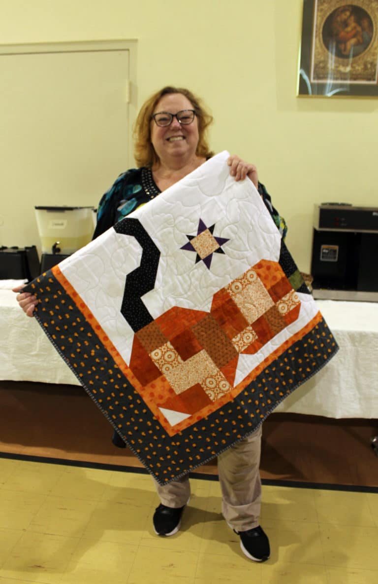 Kim Bridges of Newburgh, Ind., is taking this quilt across the Ohio River.