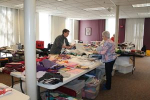 Sister Amelia and Mary Ruth Clark take a look at all the fabric