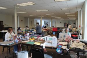 The Quilting Friends and their machines and fabric were spread out in the large conference room at the Center.