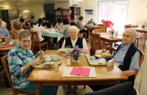 Left to right, Sister Susanne Bauer, Sister Clarita Browning and Sister Marie Goretti Browning enjoy the celebration.