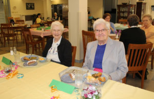 Jubilarians Sister Mary Irene Cecil, left, and Sister George Mary Hagan smile during their celebration dinner. Sister Mary Irene has been an Ursuline Sister for 70 years, while Sister George Mary has been an Ursuline Sister for 60 years.