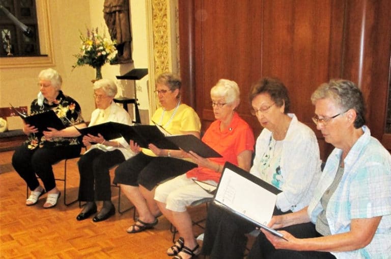 The choir for the final Mass of Community Days on July 15 practice their hymns. From left are Sisters Pat Lynch, Elaine Burke, Betsy Moyer, Barbara Jean Head, Susan Mary Mudd and Mary Ellen Backes.