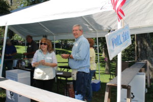 Cecilia and Bill McCarty from St. Stephen’s Parish are ready for customers in the Pull Tabs booth. They sold out of pull tabs two hours before the picnic ended.