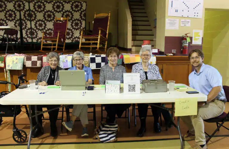 From left, Sisters Margaret Ann Aull, Judith Nell Riney, Laurita Spalding and Mary Timothy Bland, along with Cole Troutman, of the Mount Saint Joseph Finance staff, are ready to sell raffle tickets to attendees. From left, Sisters Margaret Ann Aull, Judith Nell Riney, Laurita Spalding and Mary Timothy Bland, along with Cole Troutman, of the Mount Saint Joseph Finance staff, are ready to sell raffle tickets to attendees.