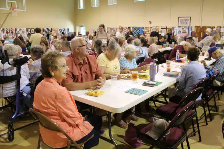 Sister Susan Mary Mudd, seated at left, served as one of the bingo table volunteers. To her left is former Mount employee Jeff Glass. Sister Susan Mary Mudd, seated at left, served as one of the bingo table volunteers. To her left is former Mount employee Jeff Glass.