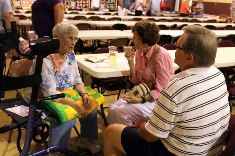 Sister Karla Kaelin, left, talks with Pat and Todd Stelmach after the bingo games were over. Sister Karla Kaelin, left, talks with Pat and Todd Stelmach after the bingo games were over.
