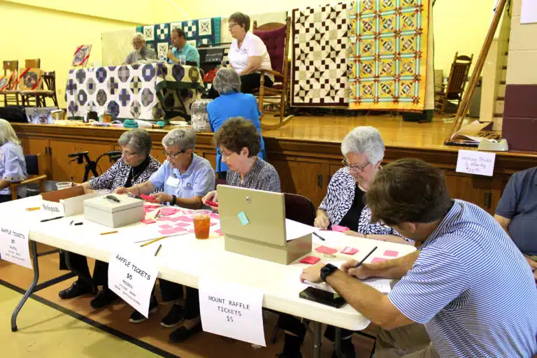 Left to right, Sisters Margaret Ann Aull, Judith Nell Riney, Laurita Spalding and Mary Timothy Bland, along with Cole Troutman, an accountant in the Sisters’ finance office, process raffle tickets. Left to right, Sisters Margaret Ann Aull, Judith Nell Riney, Laurita Spalding and Mary Timothy Bland, along with Cole Troutman, an accountant in the Sisters’ finance office, process raffle tickets.