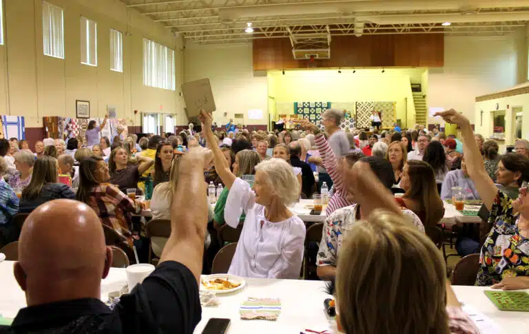 Mary Helen Nash holds up her card after getting a “bingo” during the sixth game. She won two games in a row. Mary Helen Nash holds up her card after getting a “bingo” during the sixth game. She won two games in a row.