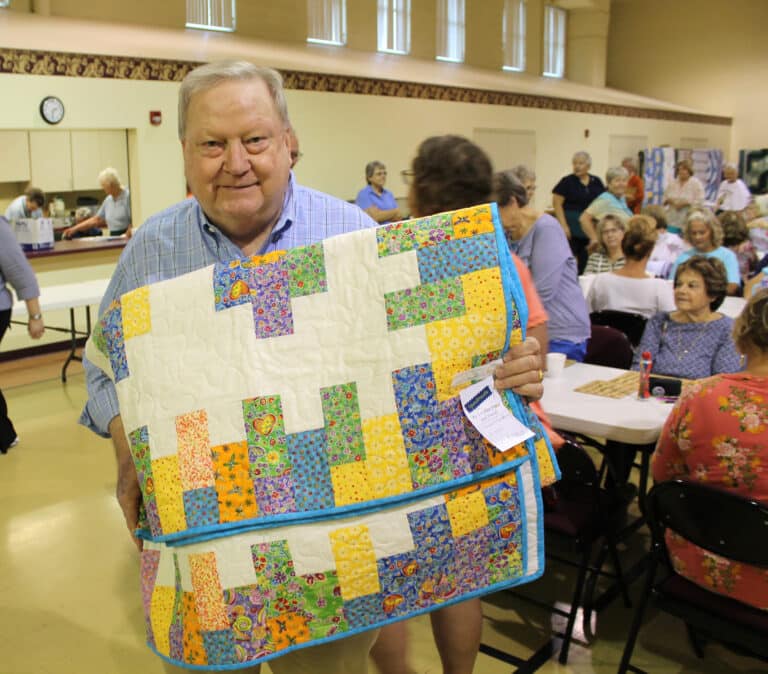 Howard Brown of Owensboro selected the “Cheese and Crackers” quilt.