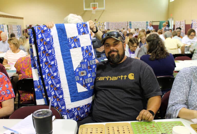 Jason Morris of Owensboro is a University of Kentucky fan, so he chose a quilt with that theme.