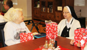 Sister Judith Osthoff, left, shares a smile with Sister Emerentia Wiesner.