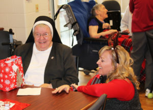 Sister Marian Powers laughs with Betsy Mullins, director of development for the Ursuline Sisters.