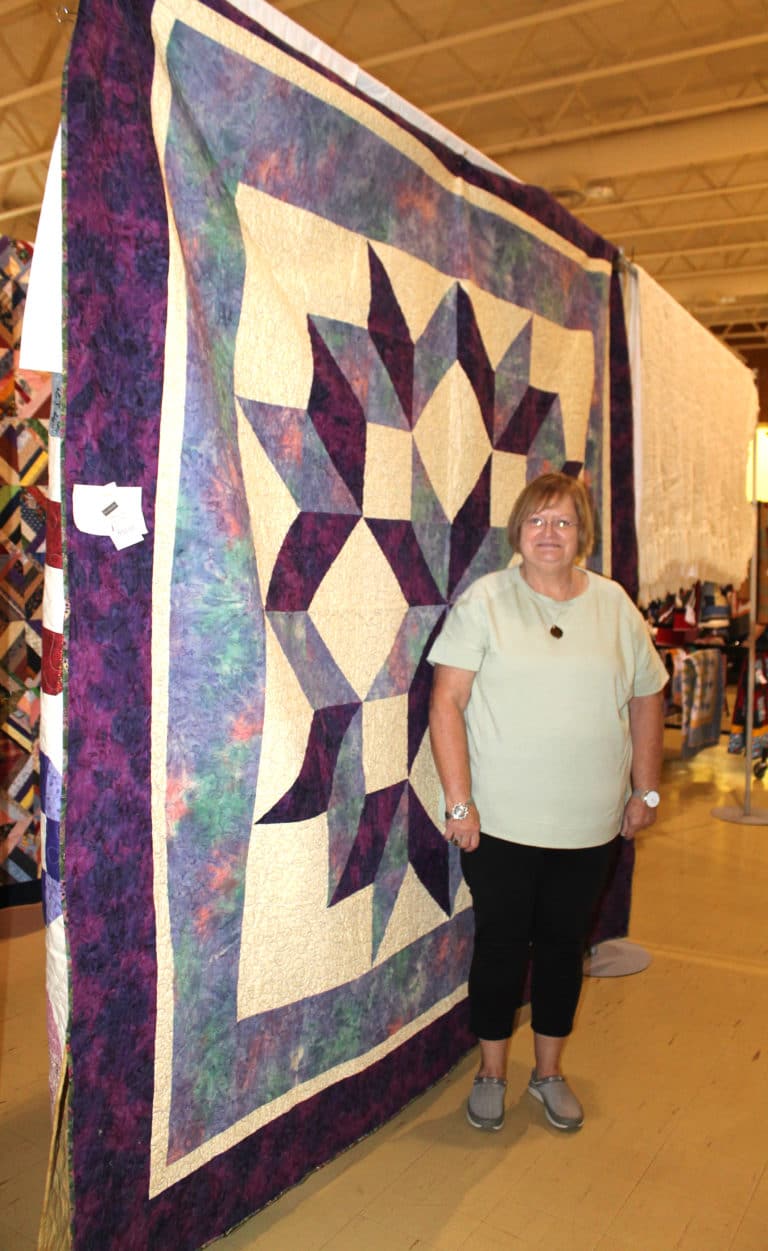 Sandra Higdon of Philpot, Ky., said she plans to donate her quilt to her parish, St. William, for its raffle.