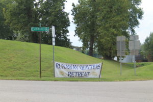 The sign that sits on Cummings Road to welcome the quilters.