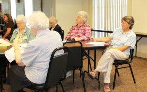 From left, Ursuline Sisters Mary Matthias Ward, Mary Agnes VonderHaar, Francis Louise Johnson and Jacinta Powers listen to Sister Ruth’s talk. It was the first “An Evening with an Ursuline” for Sister Jacinta, who recently returned from Tennessee.