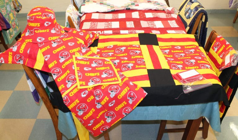 Donated Kansas City Chiefs fabric was made into multiple items that will be available to Ursuline supporters in Kansas and Missouri.