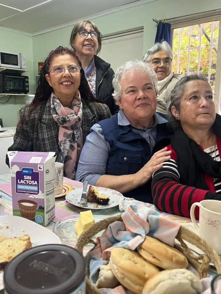 Sister Martha Keller, seated in the center, gathers with “the breakfast club,” women who prepared for their classes at Casa Ursulina and then all had breakfast together. Sister Martha Keller, seated in the center, gathers with “the breakfast club,” women who prepared for their classes at Casa Ursulina and then all had breakfast together.
