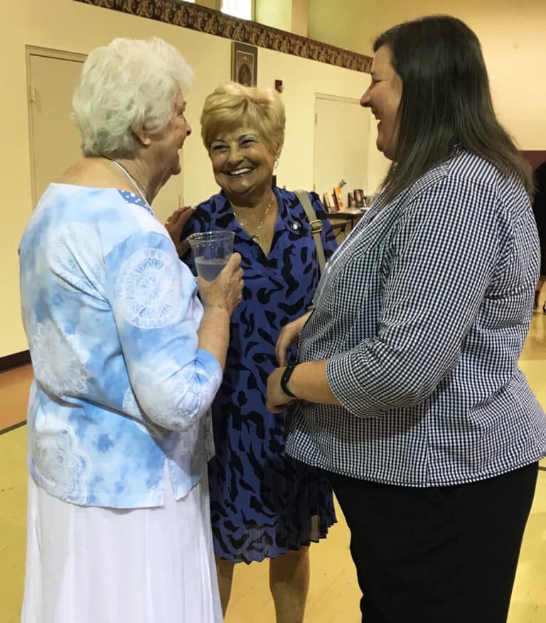 Sister Vivian Bowles, left, and Sister Monica Seaton, right, share a laugh with Leitchfield Associate Carol Hill.