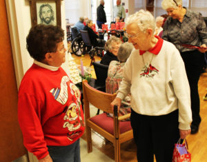 Sister Marie Bosco Wathen, right, chats with Associate Phyllis Troutman.