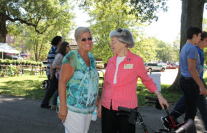 Sister Catherine Barber, right, greets a friend at the picnic.