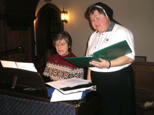 Sister Cheryl Clemons, left, and Sister Alicia Coomes practice the music for the Mass following the election of leadership in December 2009. 