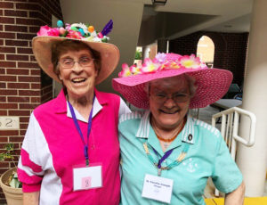 Sr. Elaine and CJ derby hats
