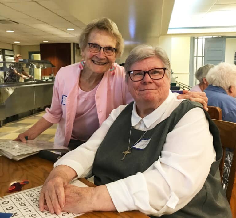 Sister Jeannette Fennewald, left, a School Sister of Notre Dame, joins Glenmary Sister Pat Leighton on the day. Sister Jeanette is a member of the Council of Religious Steering Committee.