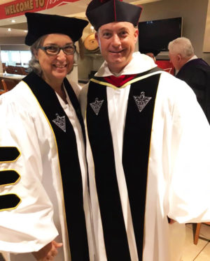 Sister Larraine stands with Father James Cuddy O.P., vice president for Mission and Ministry at Providence College. He nominated her for the honorary doctorate.