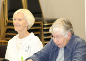 Mary Helen Nash, left, smiles at something Sister Vivian said, as Sister Ruth Gehres takes notes.