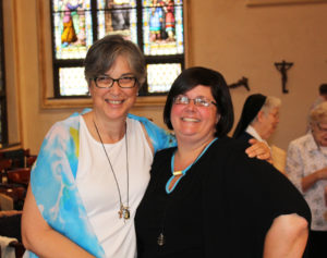 Sister Larraine Lauter, left, strikes a pose with Sister Stephany in the Motherhouse Chapel.