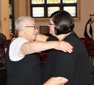 Sister Sara Marie Gomez, the lone Ursuline serving in New Mexico, gives Sister Stephany a congratulatory hug.