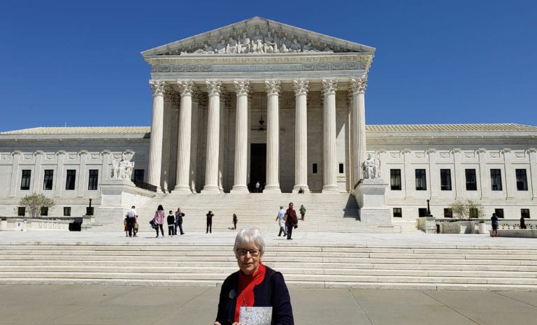 Sister Angela Fitzpatrick stands outside the Supreme Court building on her first day in Washington, D.C., April 21, 2022.