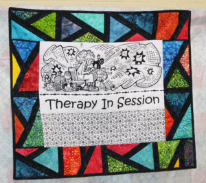 This “Therapy in Session” quilt summed up many thoughts of the women who gathered in the gymnasium for the “sit and sew.”